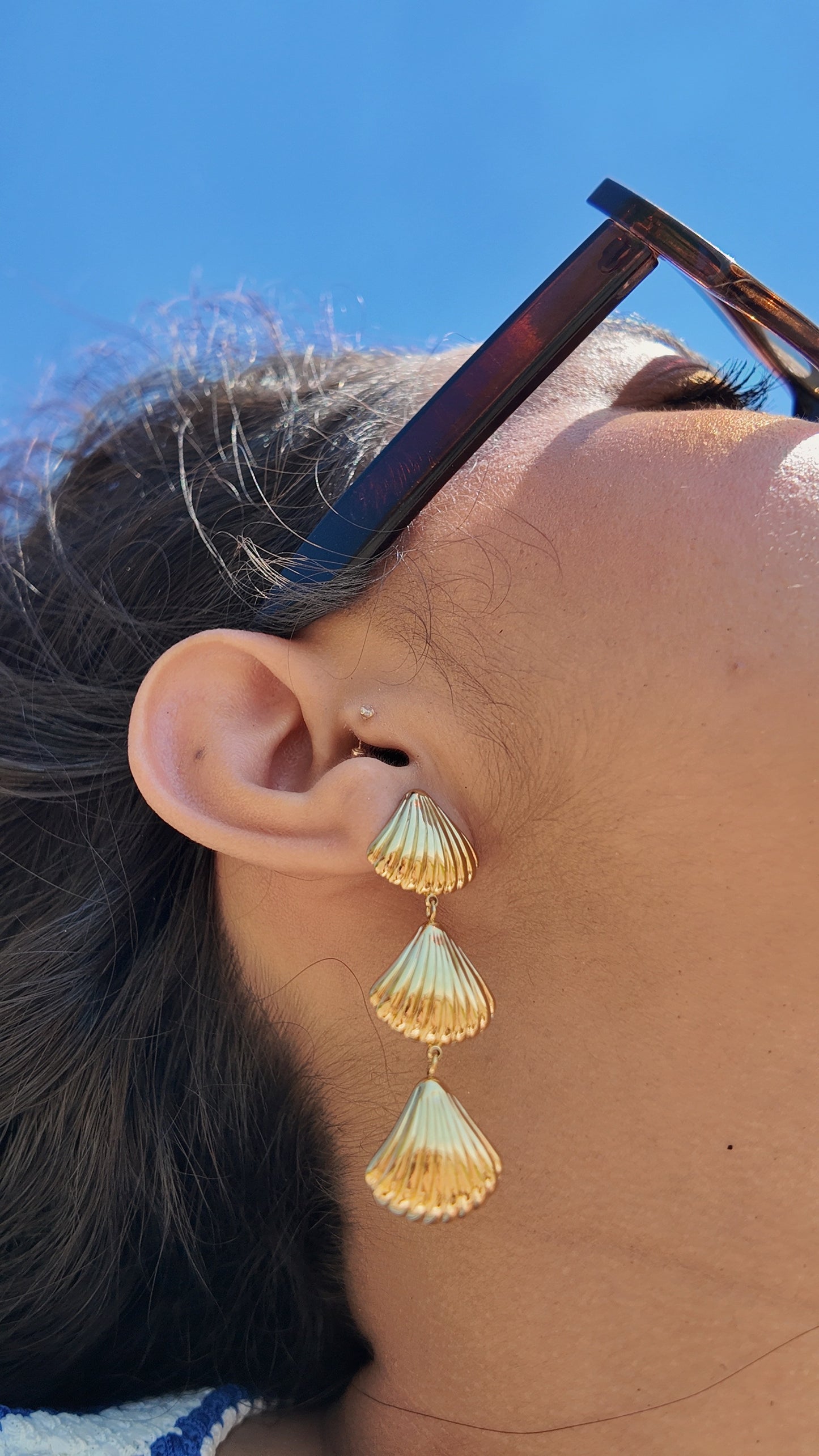 Aretes largos de conchas
