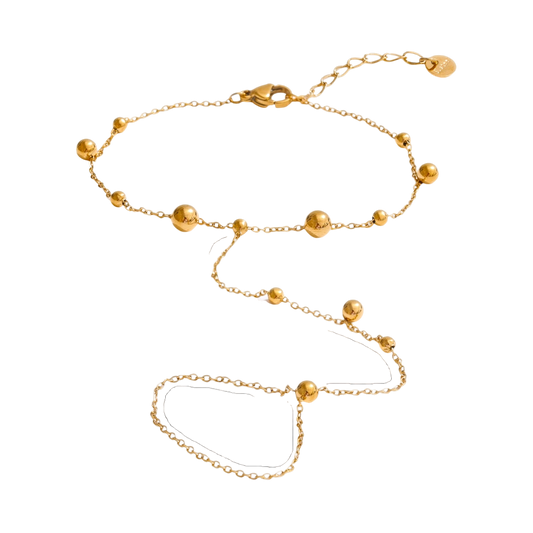 Pulsera con anillo de bolitas grandes