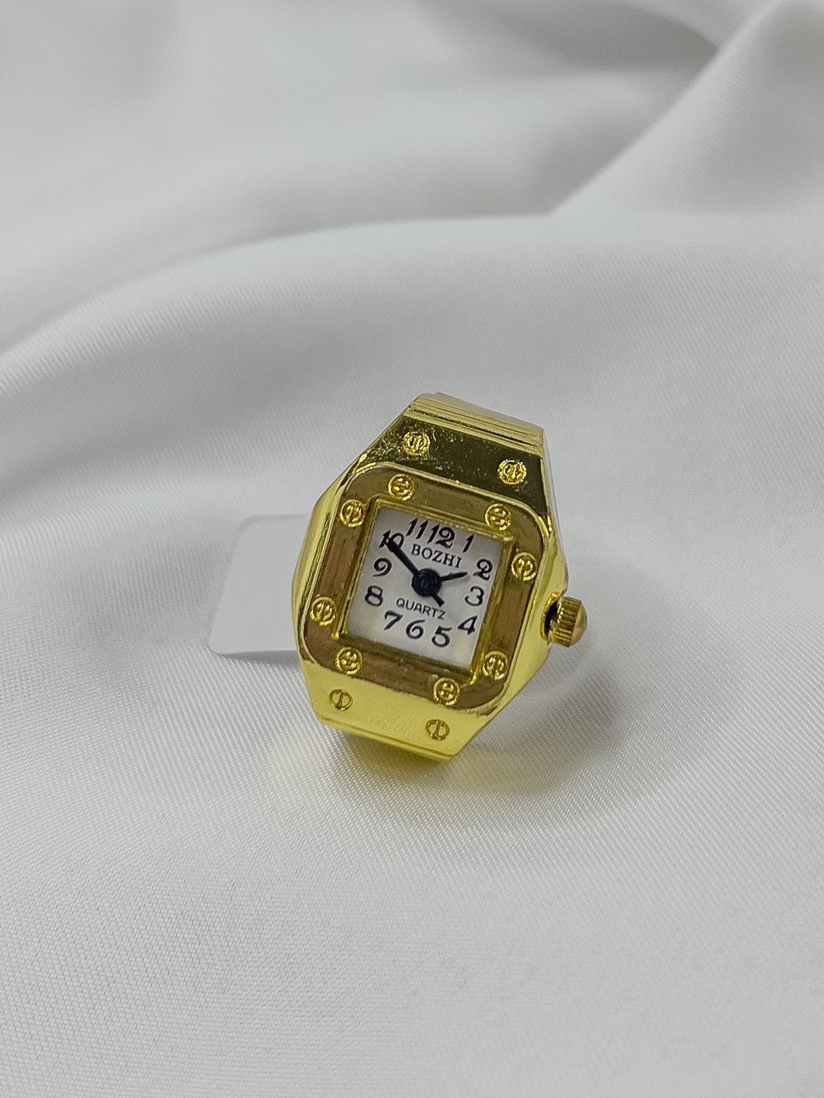 anillo con reloj incluido dorado